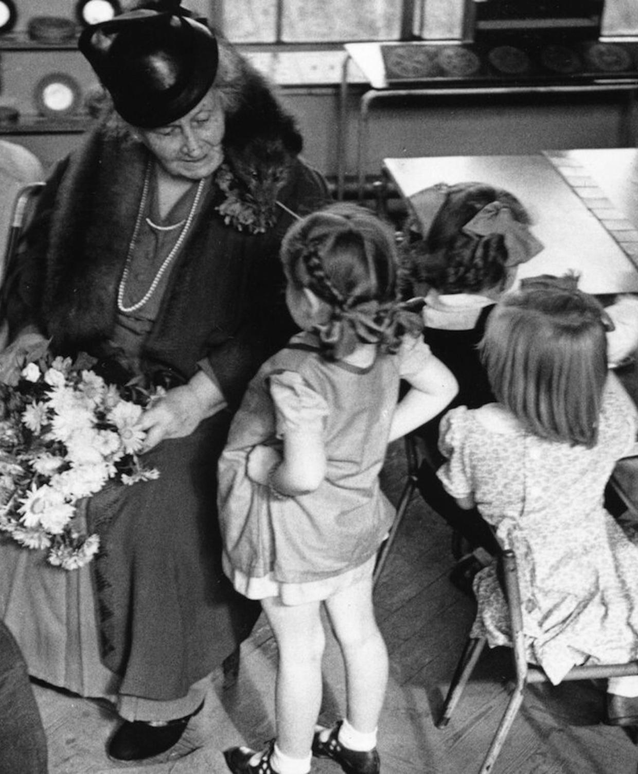 Maria Montessori in a school